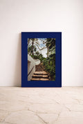 Forward, luxury framed fine art print by Noëlle Nijhuis for NOË NÍ, depicting a jungle staircase leading upwards, a calm yet adventurous statement piece for interiors