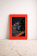 Sunrise Spectrum – colourful fine art photography by Noëlle Nijhuis for NOË NÍ, a large-scale luxury framed wall art piece with a vivid sunrise, palm tree silhouette and abstract composition